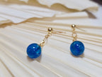 Seren - boucles d'oreilles sur éventail blanc, vue d'ensemble